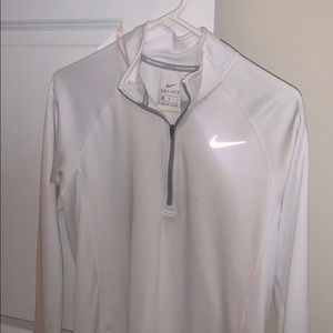 Women’s white Nike half zip